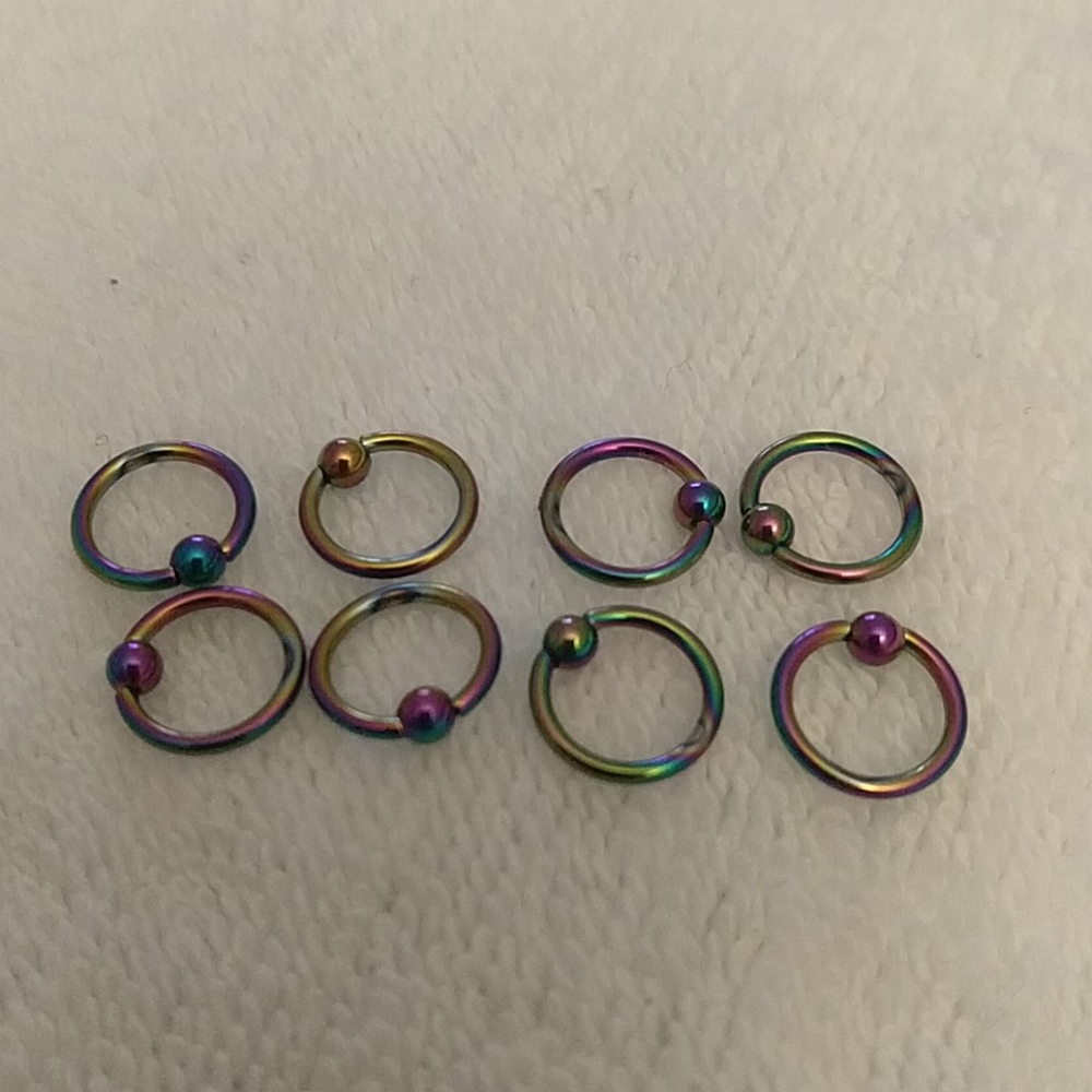 Captive ball body ring